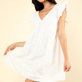 Lucia | Mini dress with a hole pattern and ruffled sleeves