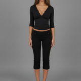 Elegant top with lace V-neck and long sleeves